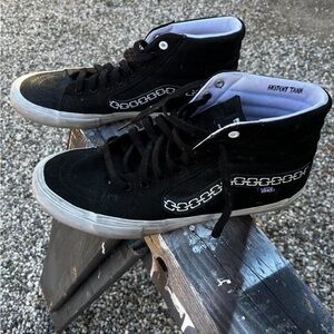 Black high top vans with chain grunge design